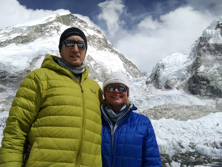 Nicky and Bob at Everest Base Camp area, with Everest behind them